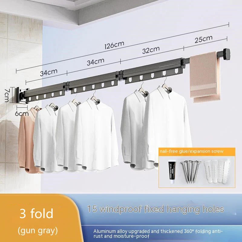 Aluminum retractable clothes drying rack mounted on wall with suction cups