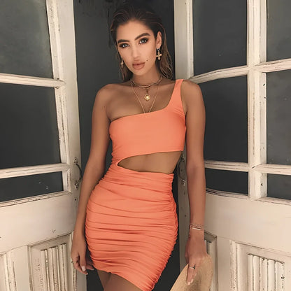 Slim one-shoulder mini dress in black polyester with wrapped chest, hollow sides, short 40cm length, sizes XS-XL