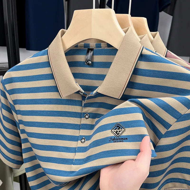 A man wearing a red, blue, or green striped short sleeve casual shirt with a mosaic pattern detail.