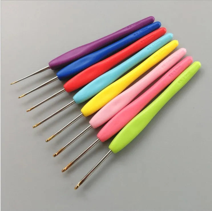 Complete 16-piece crochet hook set with soft and hard handles in a PU storage bag
