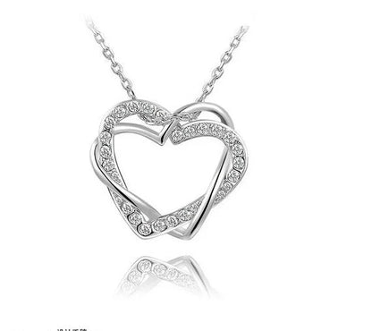 Double diamond heart necklace and earring set in silver and gold