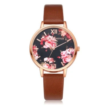 Rose gold women's watch with leather strap and love heart design
