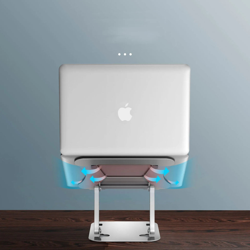 Silver aluminium alloy folding notebook cooling rack with open legs, next to a laptop on a desk