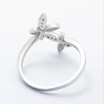 Adjustable sterling silver butterfly ring with sparkling gem settings