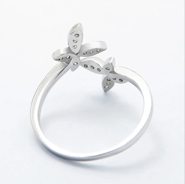 Adjustable sterling silver butterfly ring with sparkling gem settings