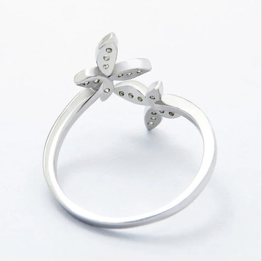 Adjustable sterling silver butterfly ring with sparkling gem settings