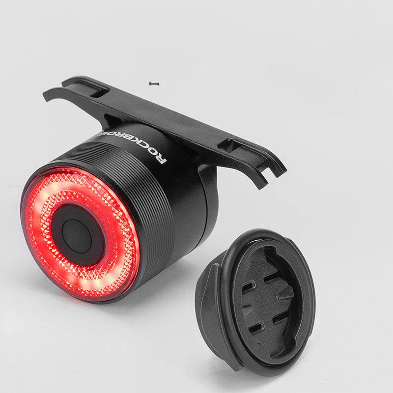Smart auto brake sensing bicycle light with IPx6 waterproof rating and USB charging