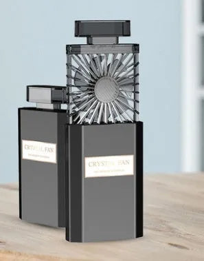 Pink perfume fan with USB charging port and compact design for personal fragrance diffusion