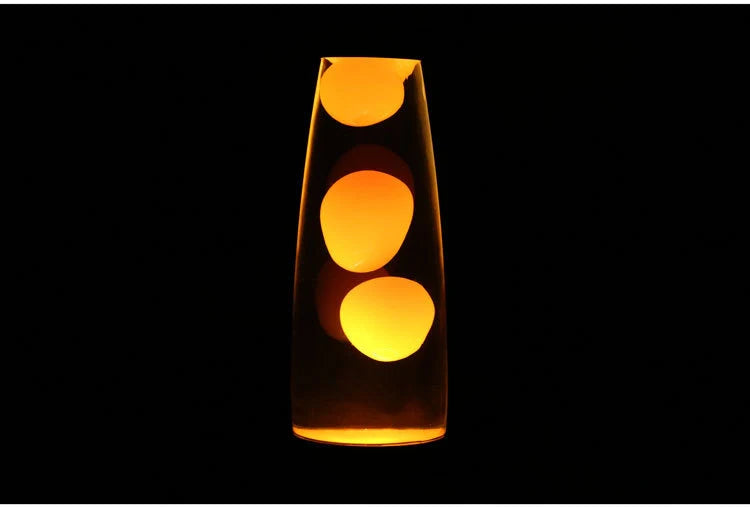 Modern 33cm lava lamp with vibrant wax colours on a wooden table