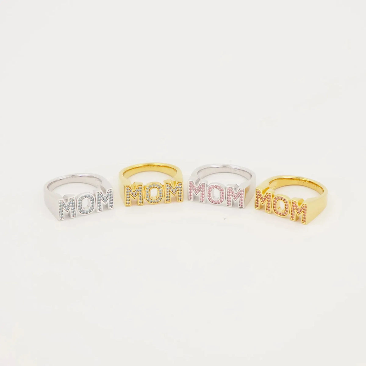 Copper open mouth ring with electroplated finish, six colour options including pink diamond gold and blue diamond silver, letter motif