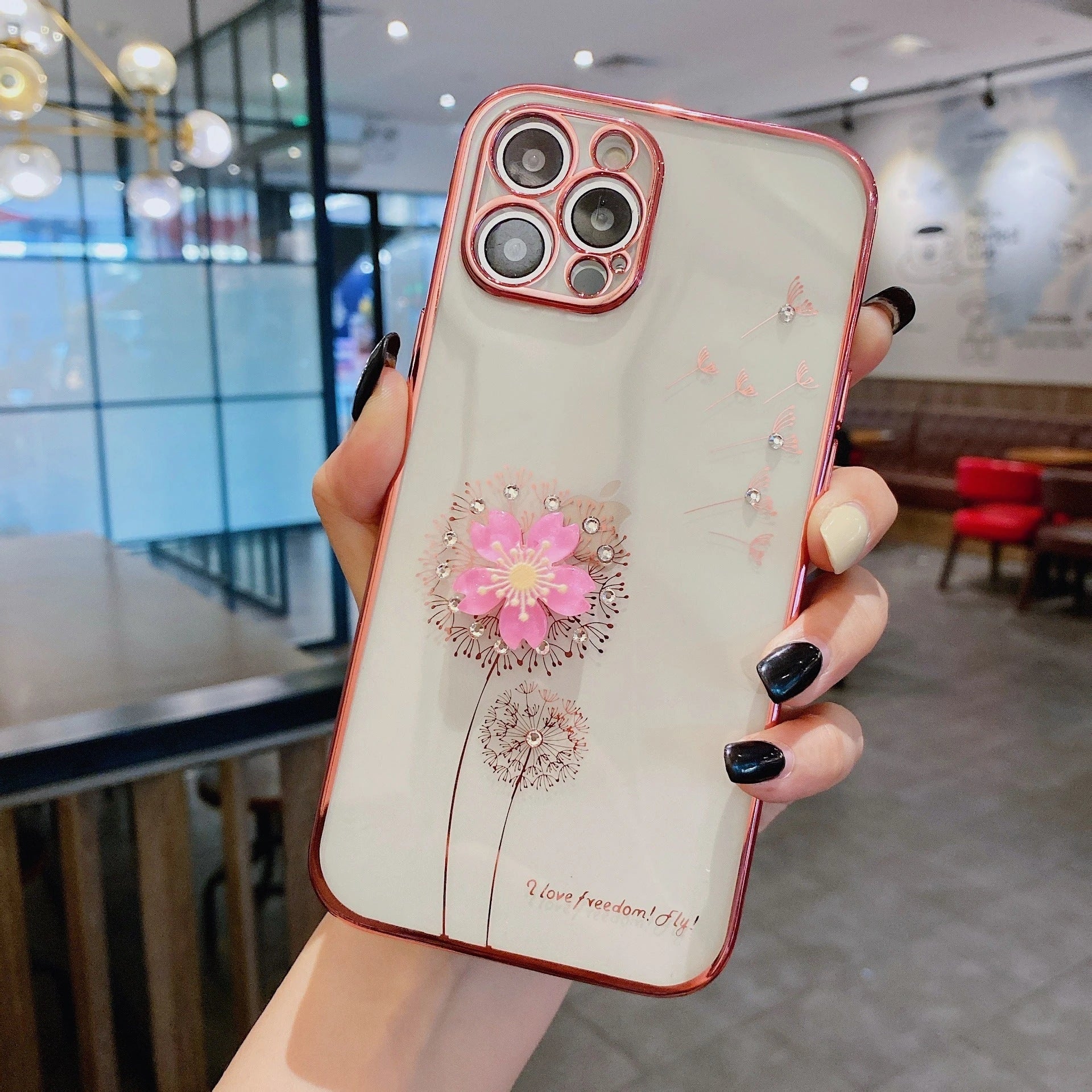 A stylish 3D flower phone case with a spinning stand, offering protection and hands-free functionality for your iPhone.