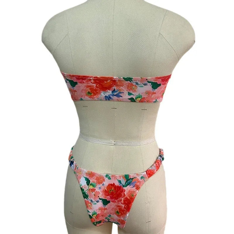 Blue floral print women's bikini set with lace trim on sleeveless tube top and matching briefs.