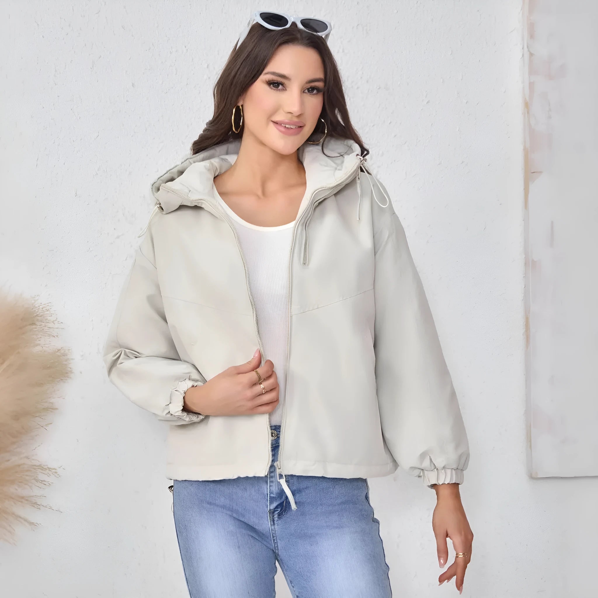 Women's loose fit hooded shell jacket in black, grey, or purple solid colour