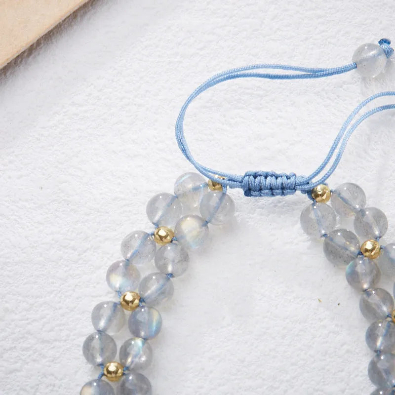 Grey moonstone geometric bracelet with butterfly woven hand rope for women.