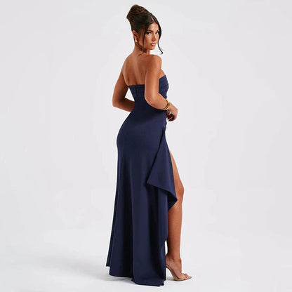 Elegant sleeveless maxi dress in various colors, featuring a backless design and an A-line silhouette for a flattering and sophisticated look.