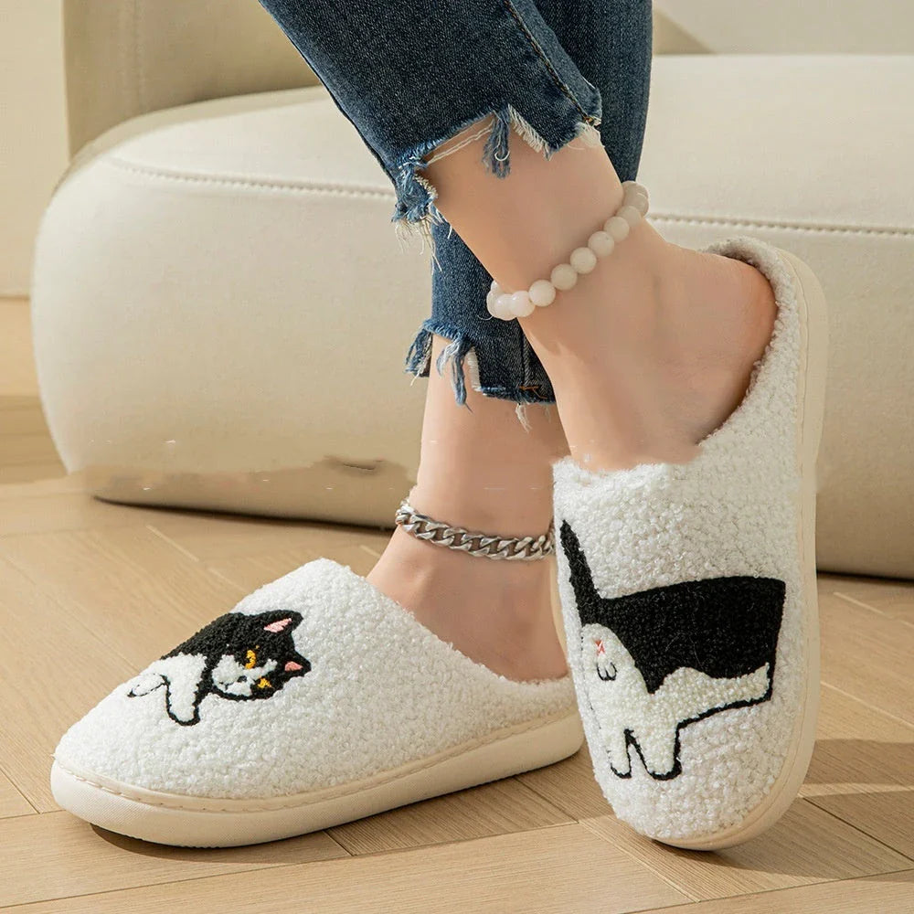 Cozy cartoon-themed cotton slippers with soft, fuzzy lining and non-slip soles for comfortable indoor and outdoor wear