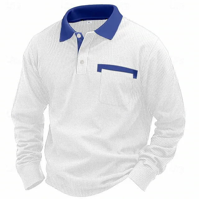 Man wearing a loose-fit long-sleeved waffle-texture polo shirt in a dark colour.