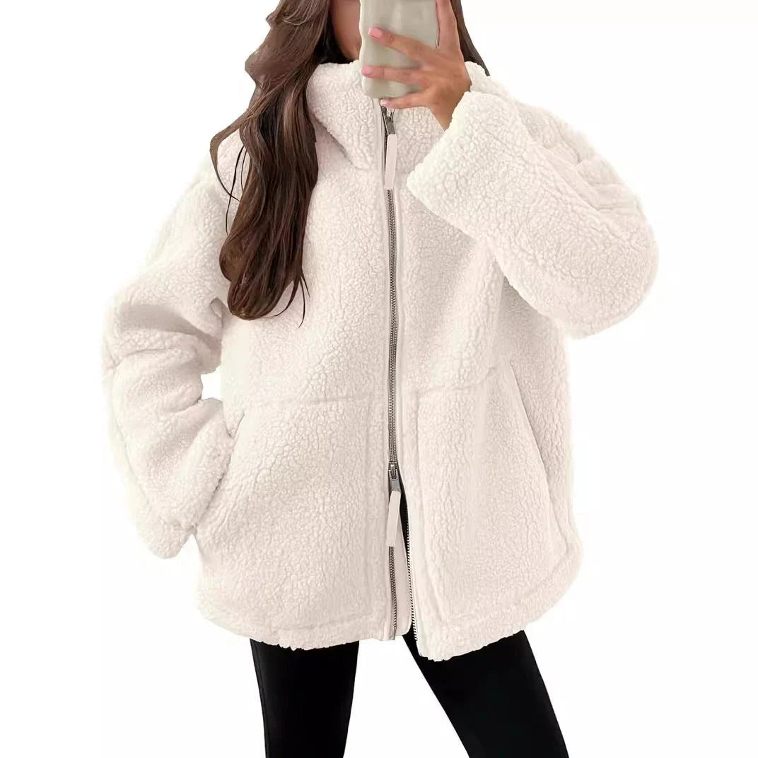 Stylish women's fleece zip-up jacket with pockets in various colours