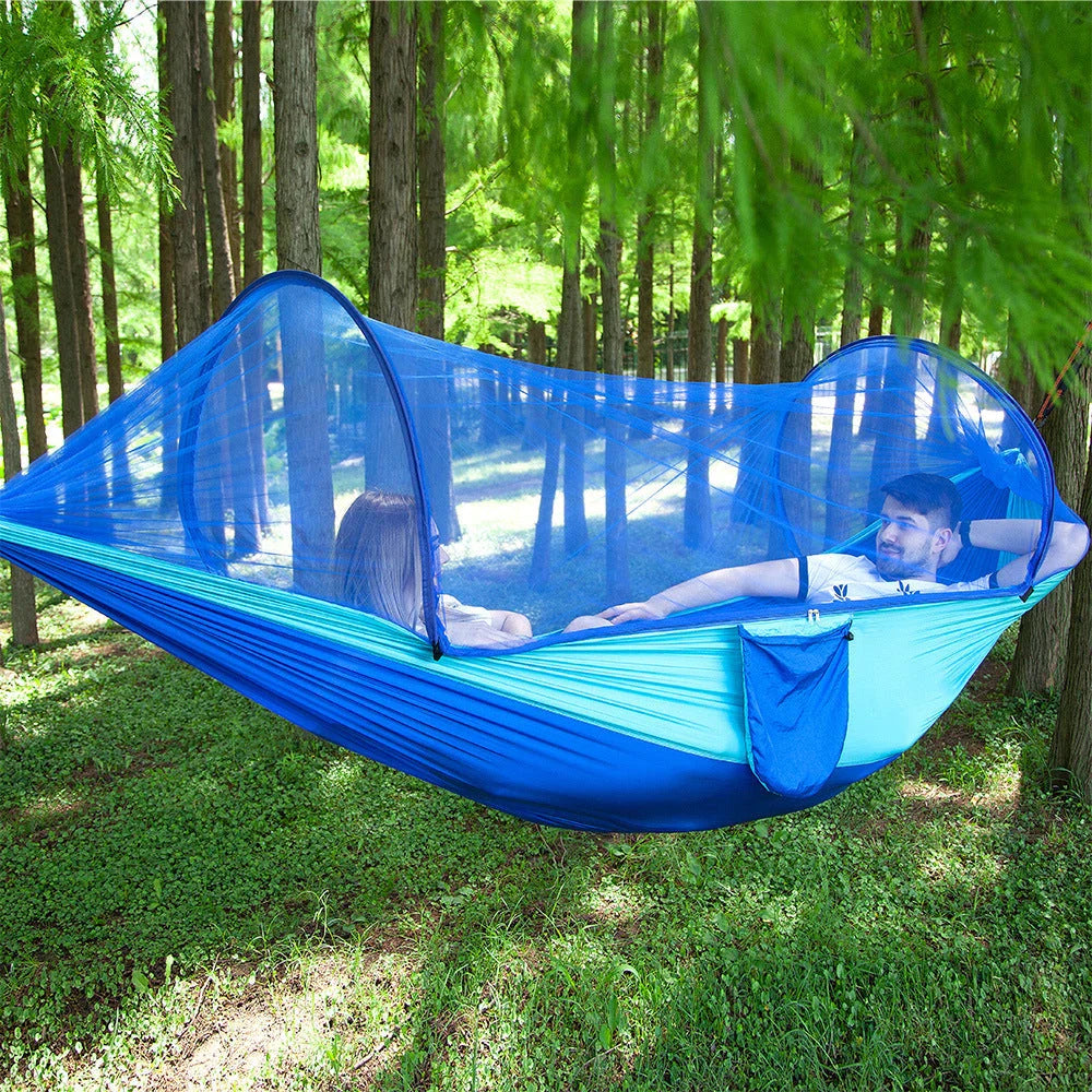 Cozy outdoor hammock with quick pop-up mosquito net, perfect for camping, hiking, and backyard relaxation
