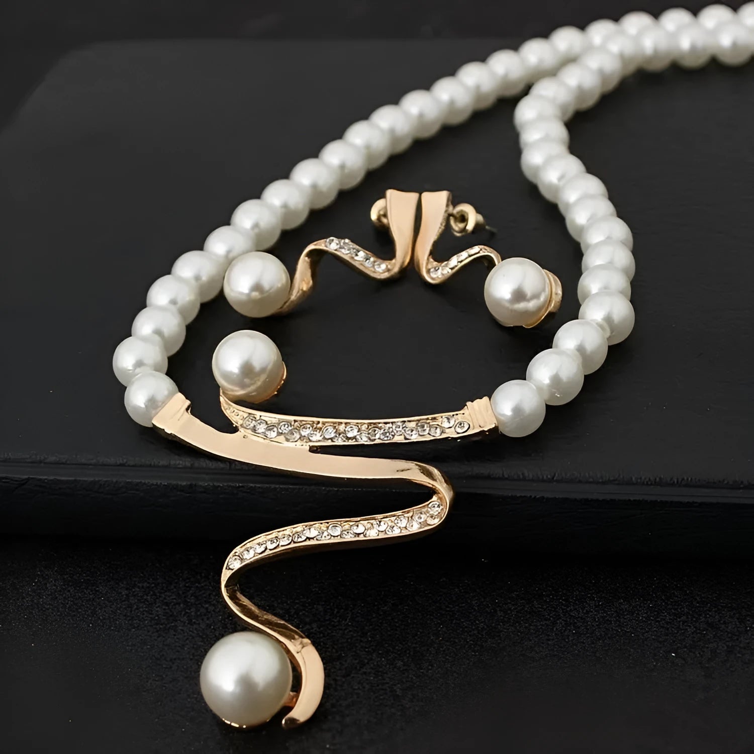 Gold electroplated pearl necklace and earrings set with deep V clavicle necklace design