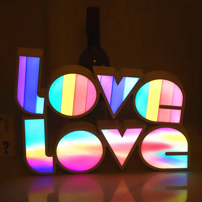 Rainbow halo style LED LOVE light sign measuring 35.5 x 13.5 cm for Valentine's Day decoration