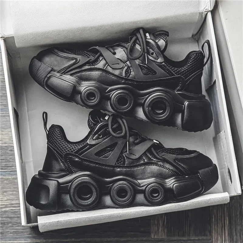 Men's black casual sneakers with a breathable mesh upper and thick rubber sole for height increase
