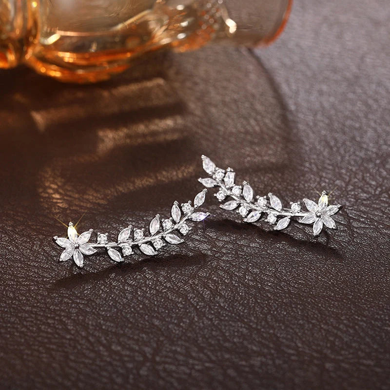 Floral diamond earrings for women in white gold, gold, and rose gold finishes