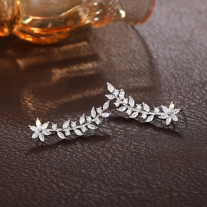 Floral diamond earrings for women in white gold, gold, and rose gold finishes