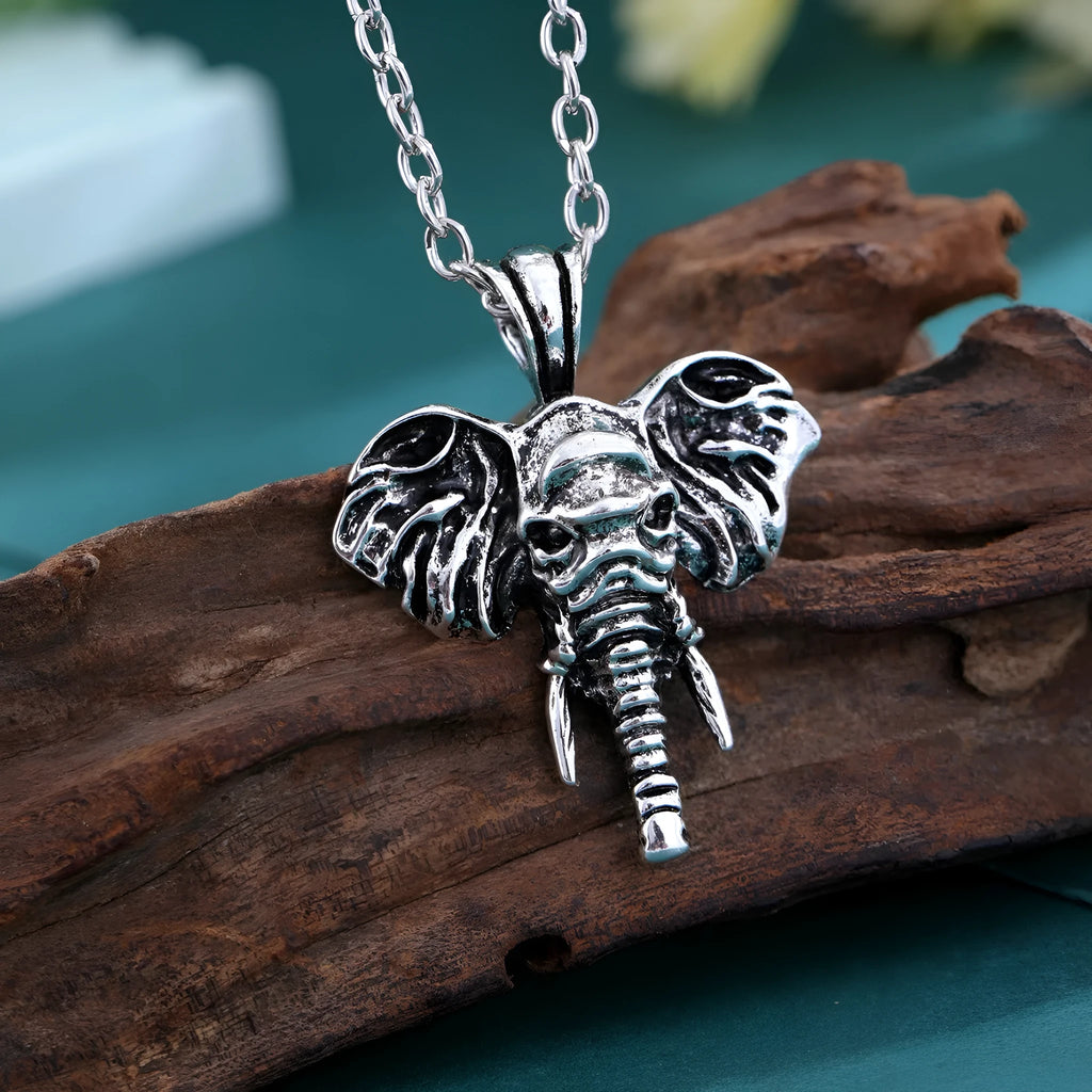 Silver and black elephant god pendant necklace on display, stainless steel construction for men.