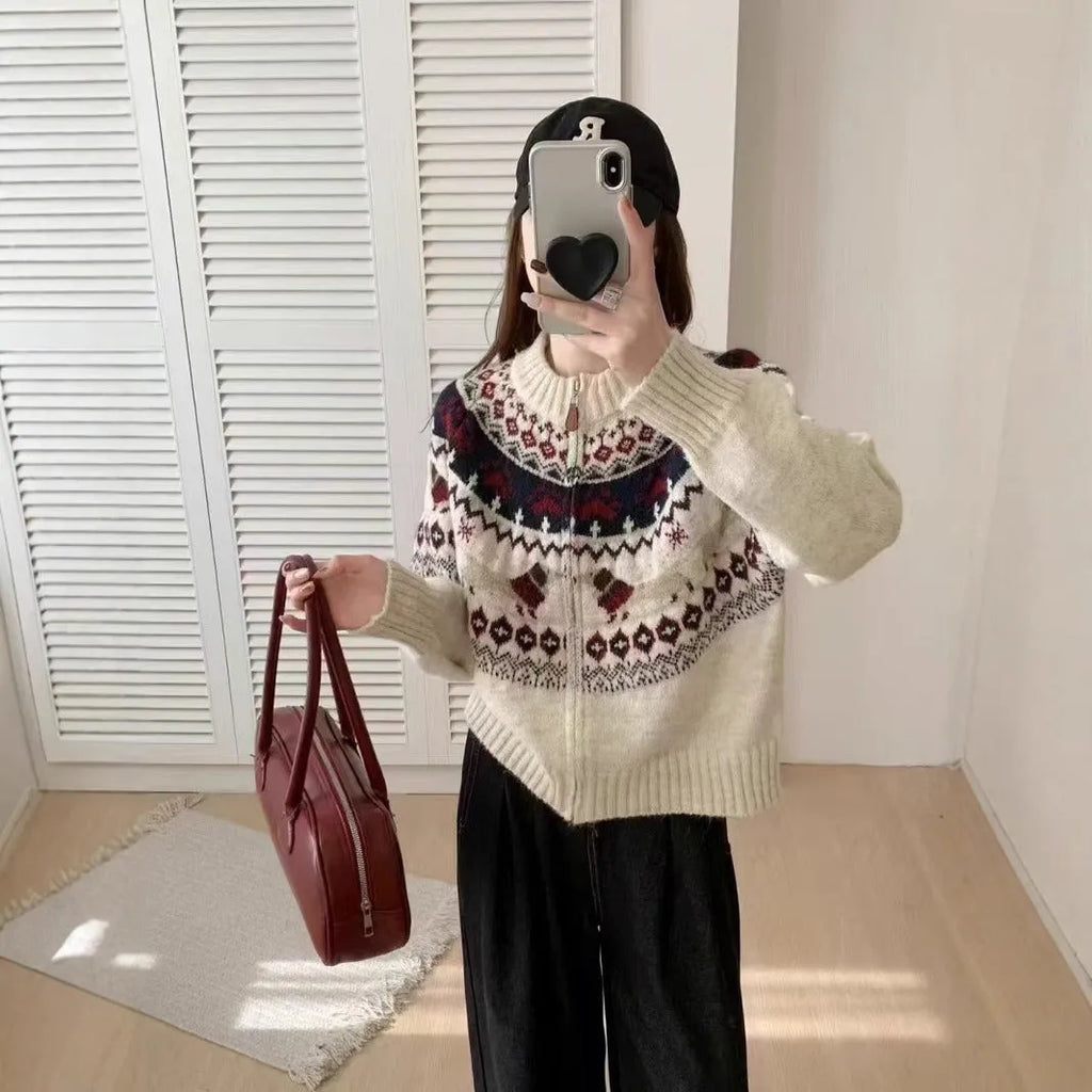 Ethnic Jacquard pattern pullover sweater with 3D effect in loose fit.