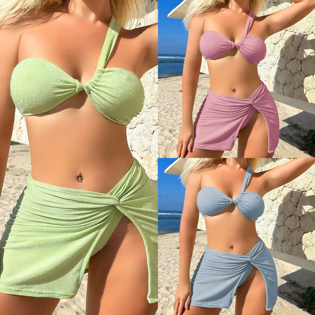 Women's one-shoulder tube top swimsuit three piece set in glossy polyester fabric, shown in light green.
