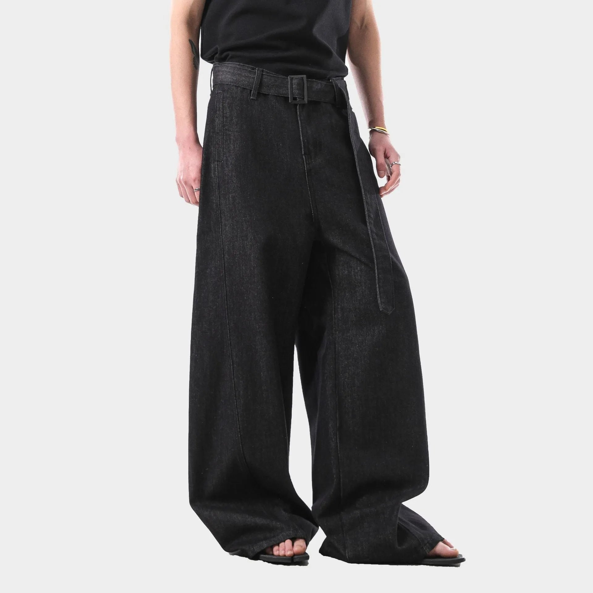 Black women's high-waist straight-leg jeans with gold stitching and a zip fly closure.