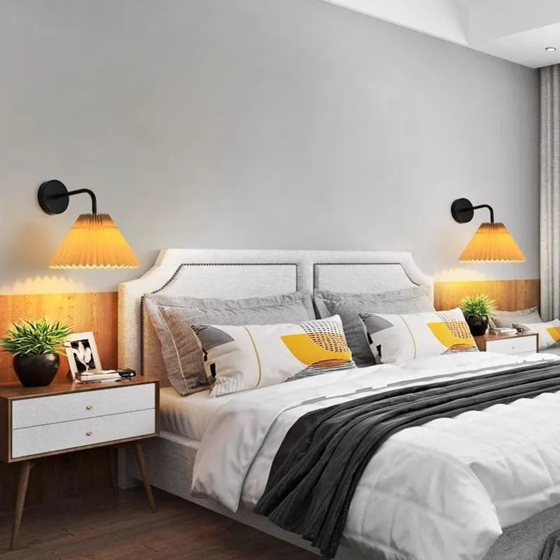 Retro LED wall lamp in iron finish with apricot colour option for bedside reading