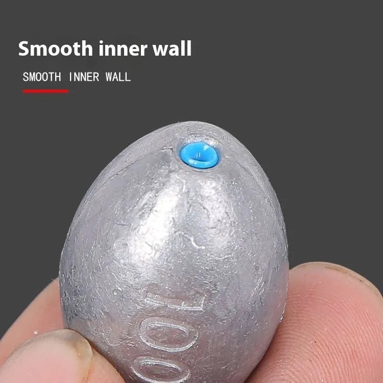Rugby-shaped olive lead fishing sinker with scale texture, showing plastic core and weight options from 10g to 150g.