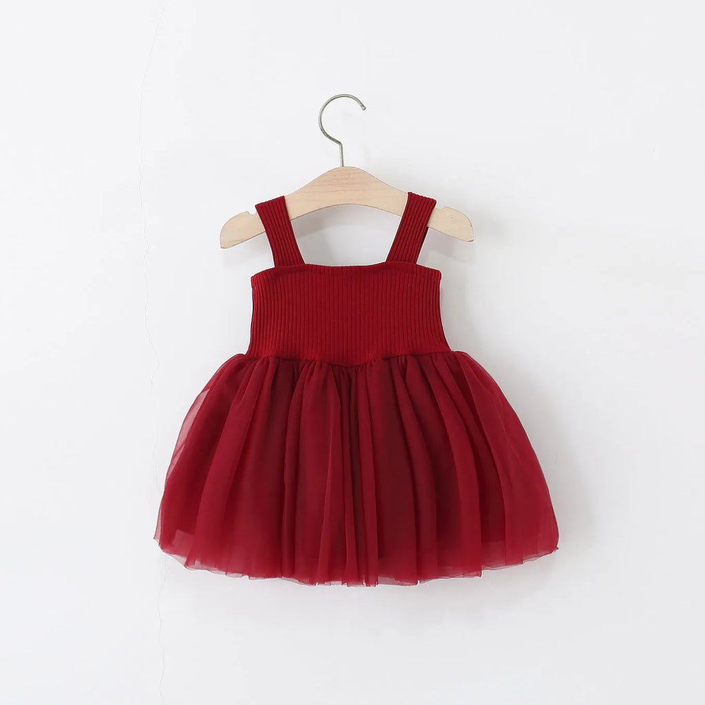 Girls sleeveless solid colour summer dress in polyester fibre, sling style, available in pink and red sizes 80-120