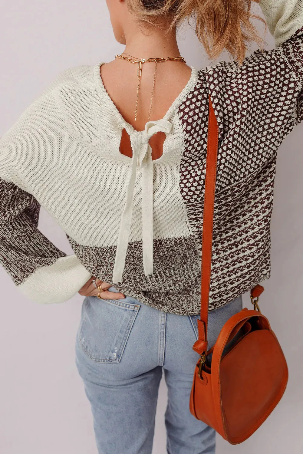 Dark khaki colour block loose sweater with long sleeves, dropped shoulders, and a back tie.