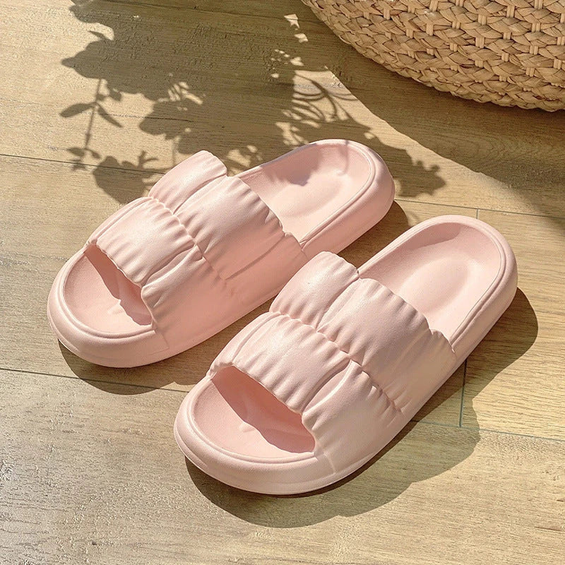 Plush Bathroom Slides in various colors and designs, featuring a soft, comfortable EVA sole and breathable upper material.