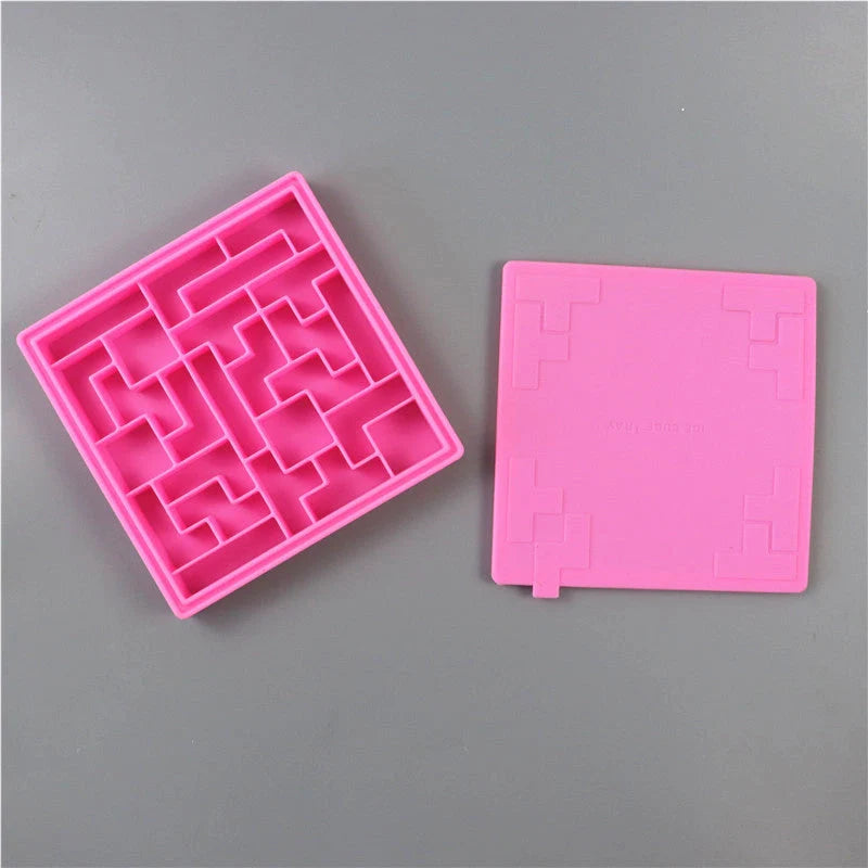 Labyrinth silicone ice cube tray in yellow, blue, and red for unique ice cubes