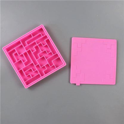 Labyrinth silicone ice cube tray in yellow, blue, and red for unique ice cubes