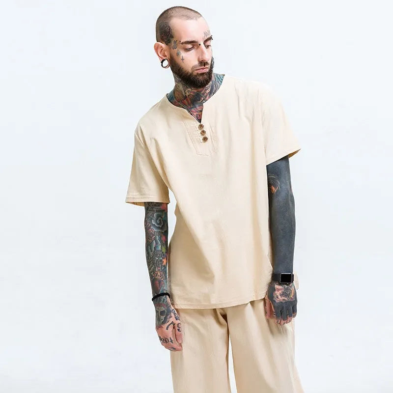 Men's loose cotton t-shirt in apricot colour showing pullover style with short sleeves