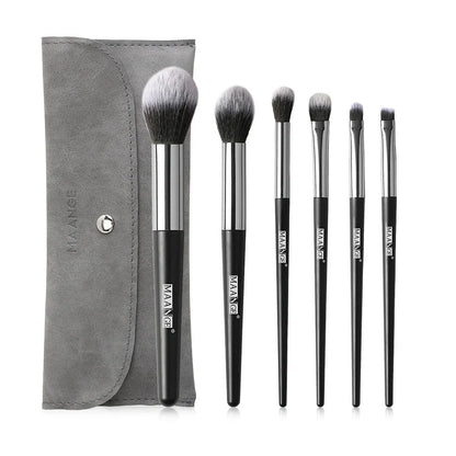 Six makeup brushes with black synthetic bristles and natural wood handles measuring 15cm