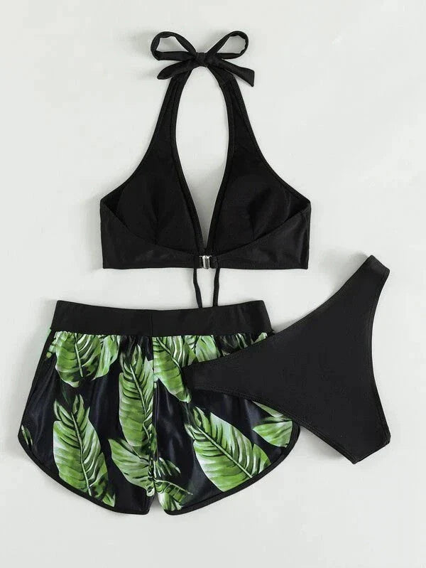 Chic leaf-patterned women's swimsuit set with bikini top, bottoms, and matching shorts in various vibrant colors