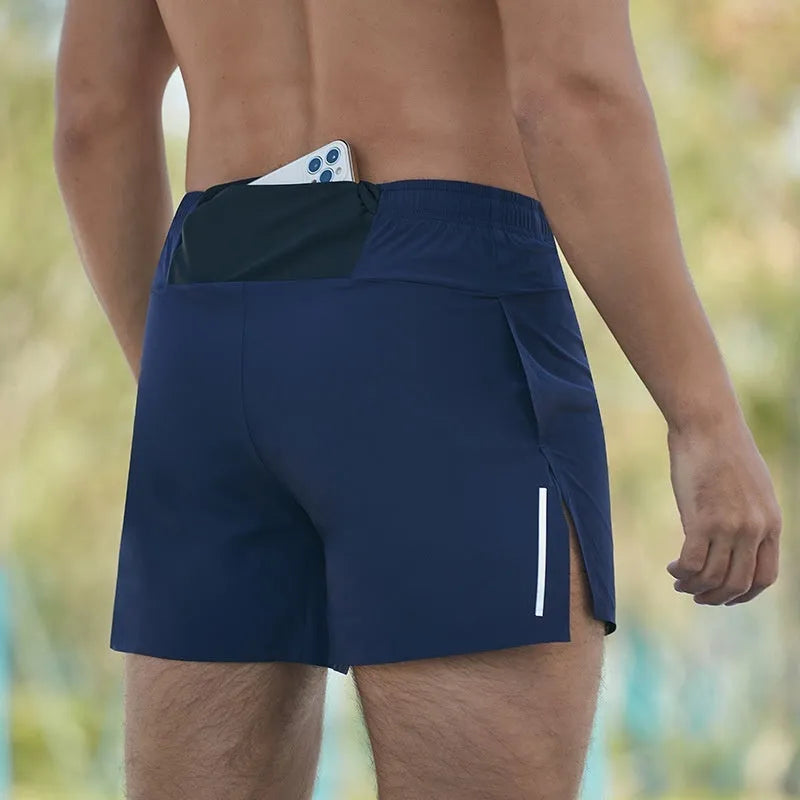Men's black loose-fit off-road running shorts with a high waist, made from quick-dry fabric.