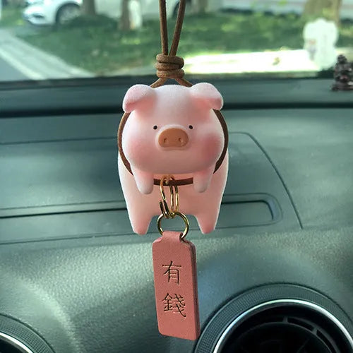 Resin cartoon pig car dashboard decoration ornament in one of eight available styles.