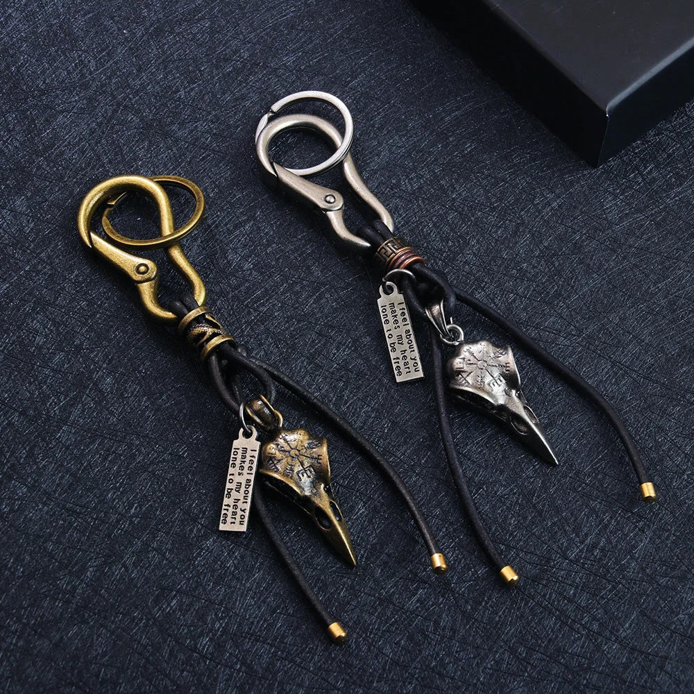 Retro leather rope keychain with lobster buckle and skull pendant in bronze and silver