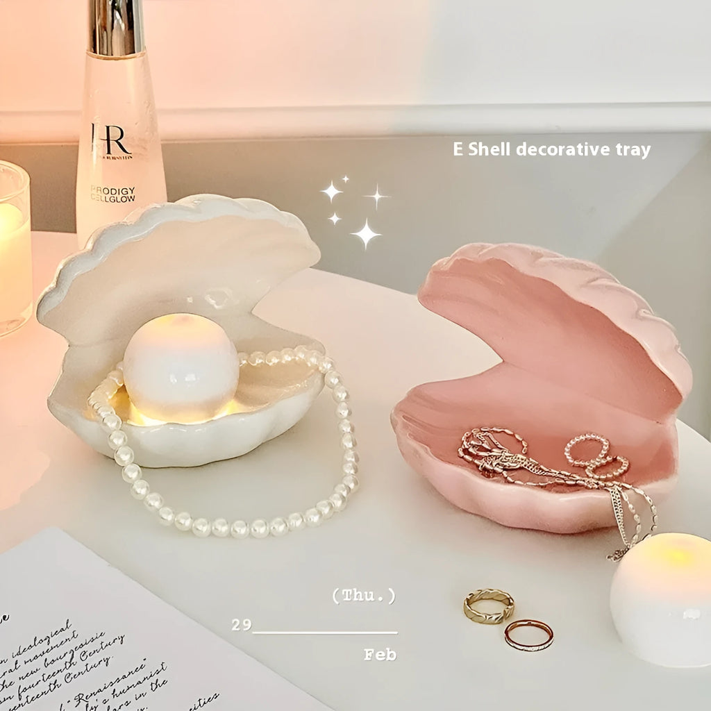 Yellow porcelain ornamental tray with optional night light, shown with white and pink shell options.