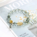 Green Phantom Quartz crystal bracelet with geometric beads and gold accents
