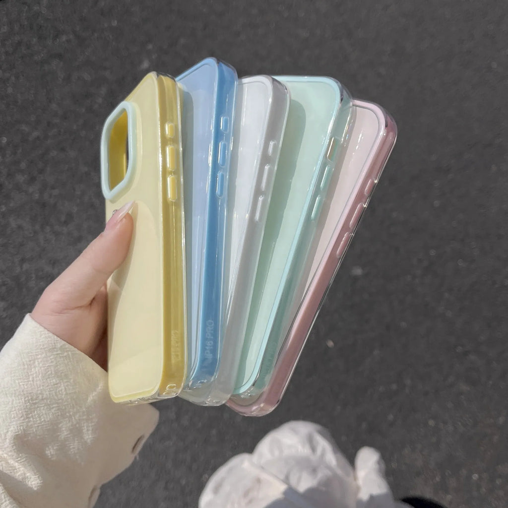 Clear jelly iPhone phone case in solid blue colour on an iPhone, showing bumper-style all-inclusive protection.