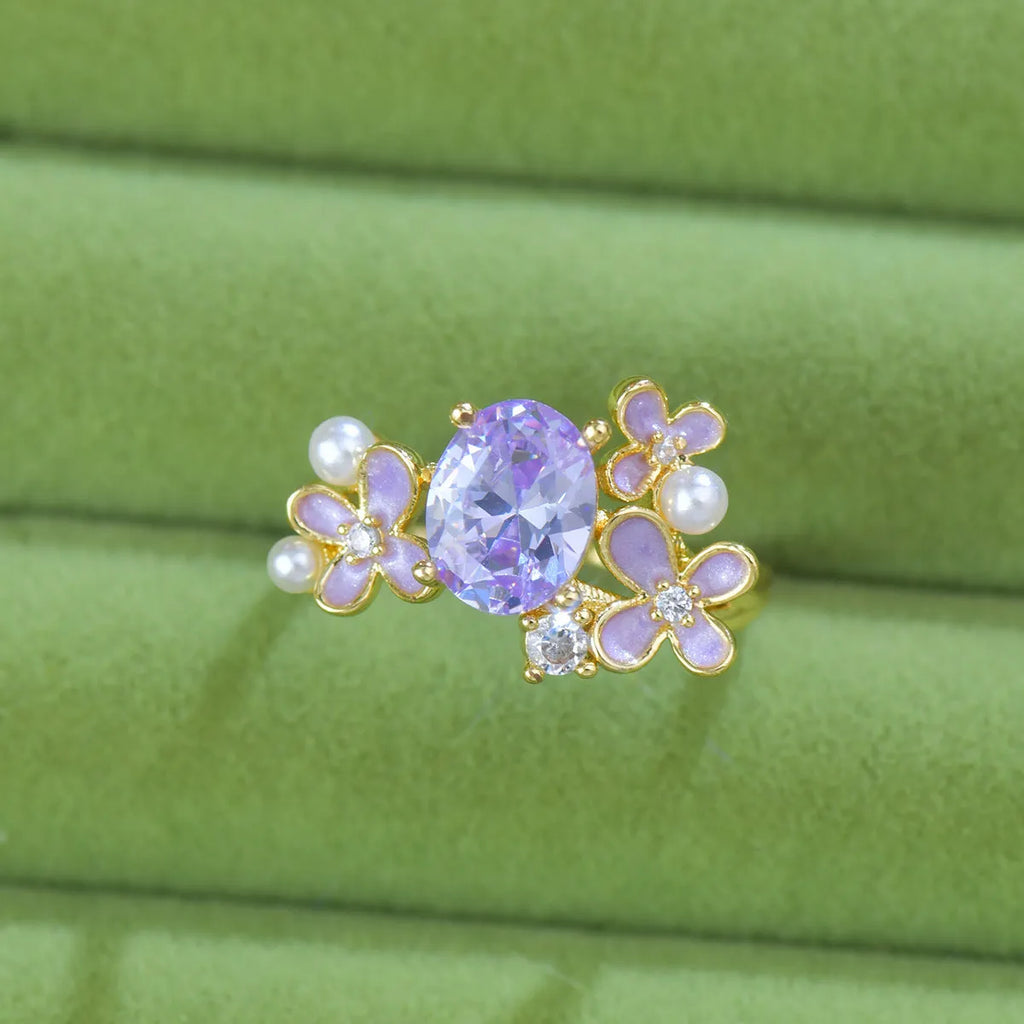 Women's open ring with flower design and zircon detail in light purple or yellow colour options
