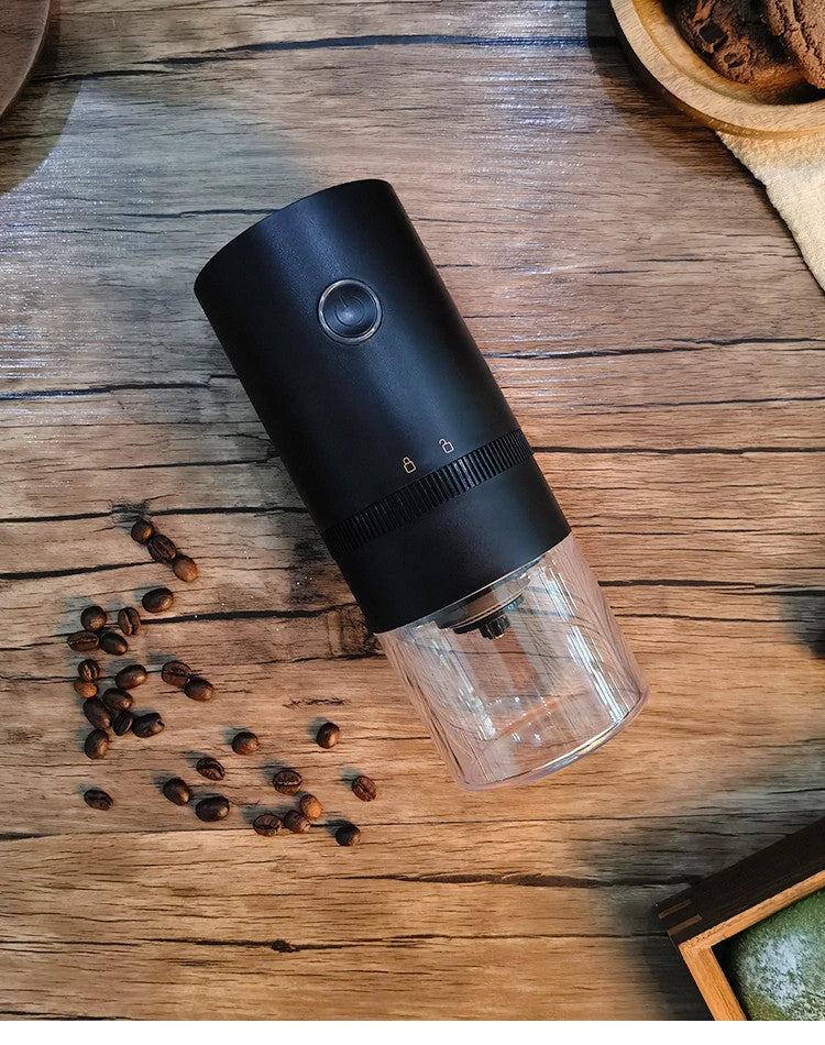 Portable electric coffee grinder with USB-C charging, adjustable grind settings, and dishwasher-safe removable bins